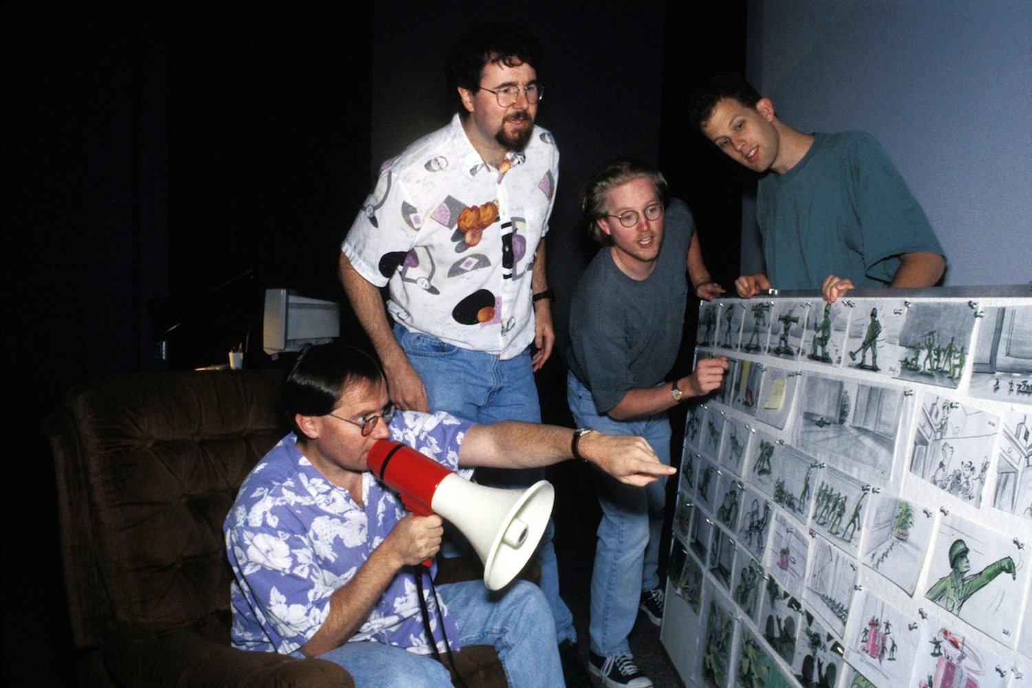 A Pixar story session at the Toy Story boards, Lasseter with a bullhorn