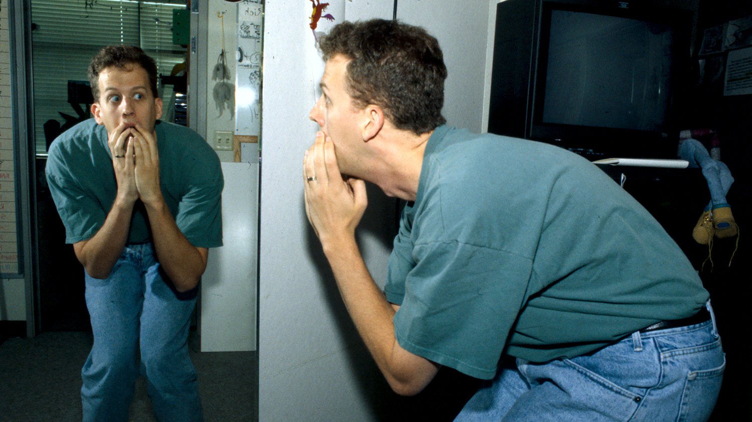 A Pixar staffer mugging a scared face in the studio